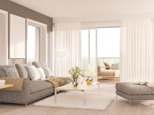 Soggiorno con palette colori neutra e arredo equilibrato