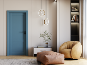Poltrona color ocra, pouf in pelle e porta azzurra in un interno contemporaneo